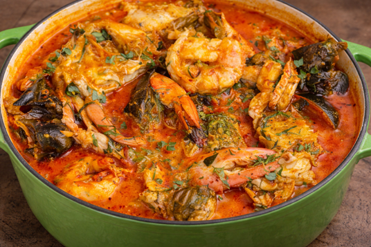 seafood soup with fish and prawns