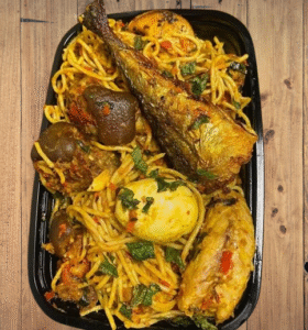 How to make Delicious Native Jollof Spaghetti Recipe with Smoked Fish, Boiled Eggs, and Cow Skin Meat 3 Native Jollof Spaghetti